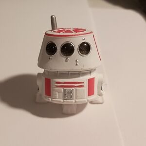 White and Red Robot Figure